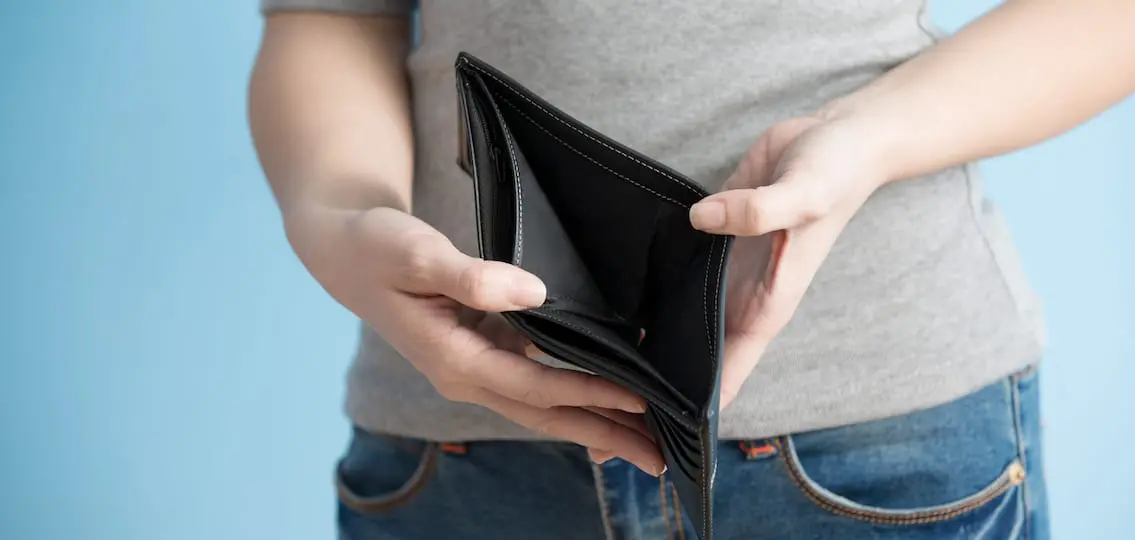 woman with no money in her pants wallet