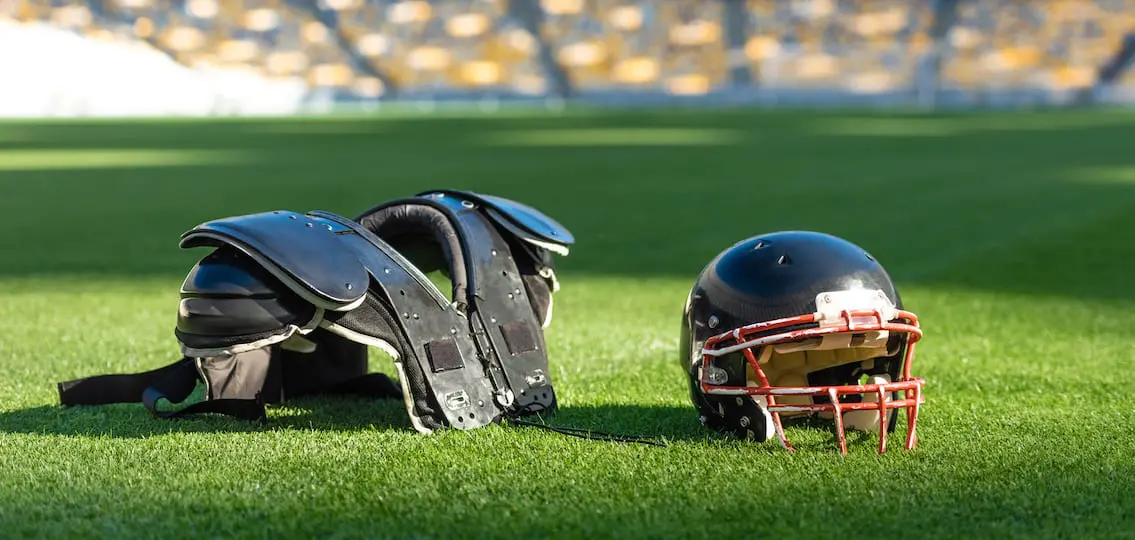 Football Equipment lying on an empty football field