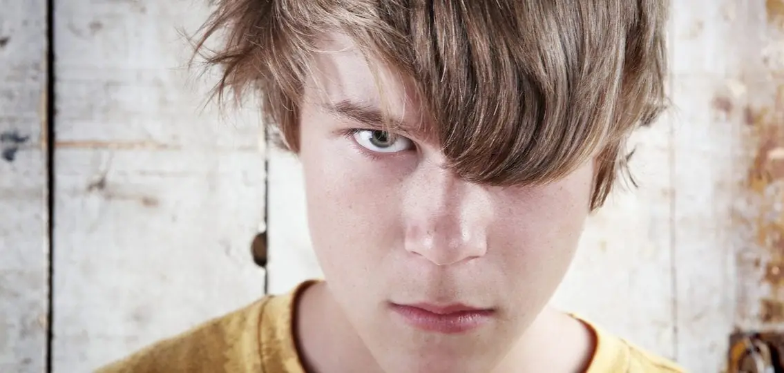 teenager says I hate you angry close up bangs in face