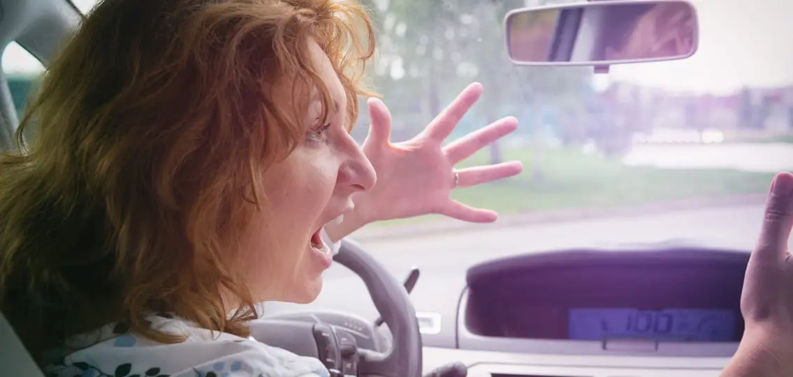 Angry parenting, Woman Screaming While Driving A Car