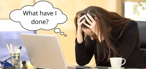 a woman suffering after a social media mistake with a thought bubble reading "what have I done?"