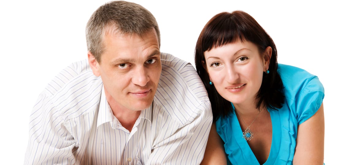 Middle Age Couple white background standing next to each other