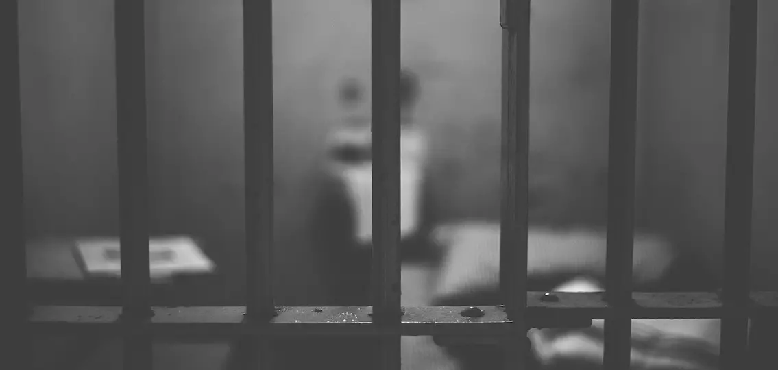 Prison bars black and white