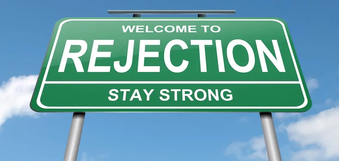 green welcome sign cartoon reading: welcome to rejection stay strong