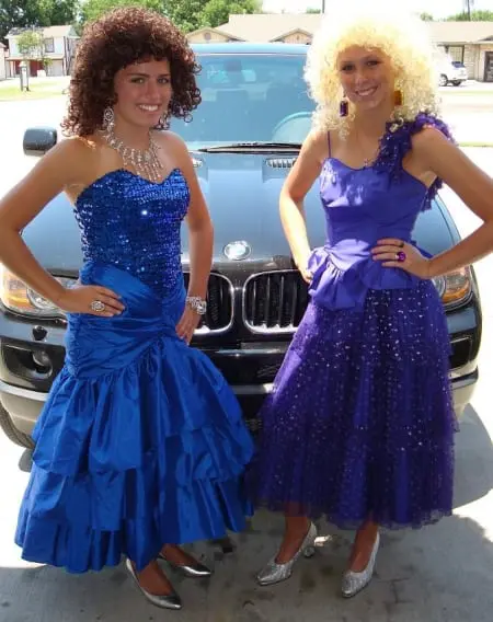 Blue and purple prom dresses on models with huge 80s hair. Source: dallasvintageshop.com