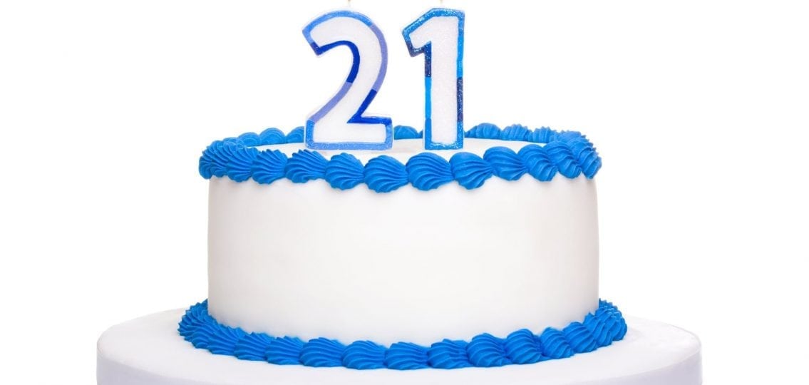 a cake with candles that say 21