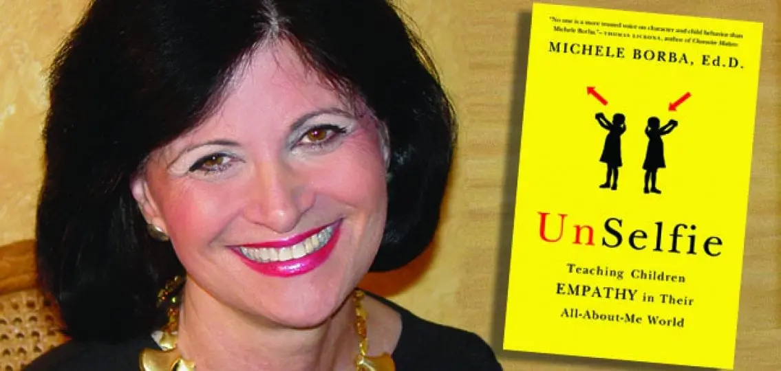 Michele Borba, Ed.D. next to her book UnSelfie