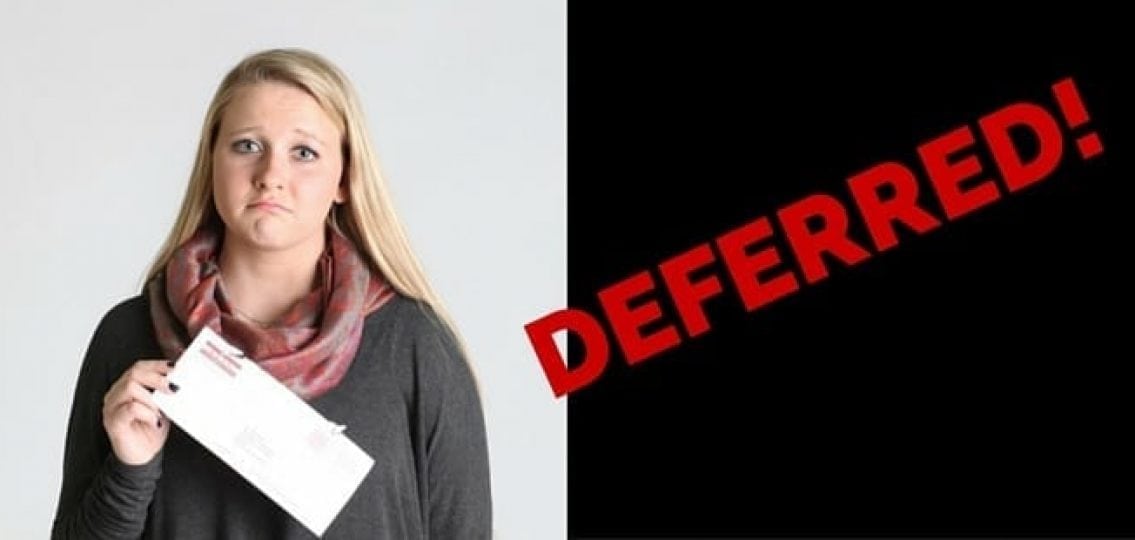 sad girl holding a letter next to the word Deferred