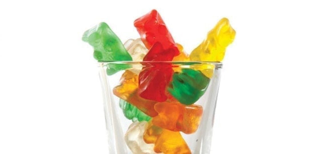 alcohol gummy bears in a shot glass