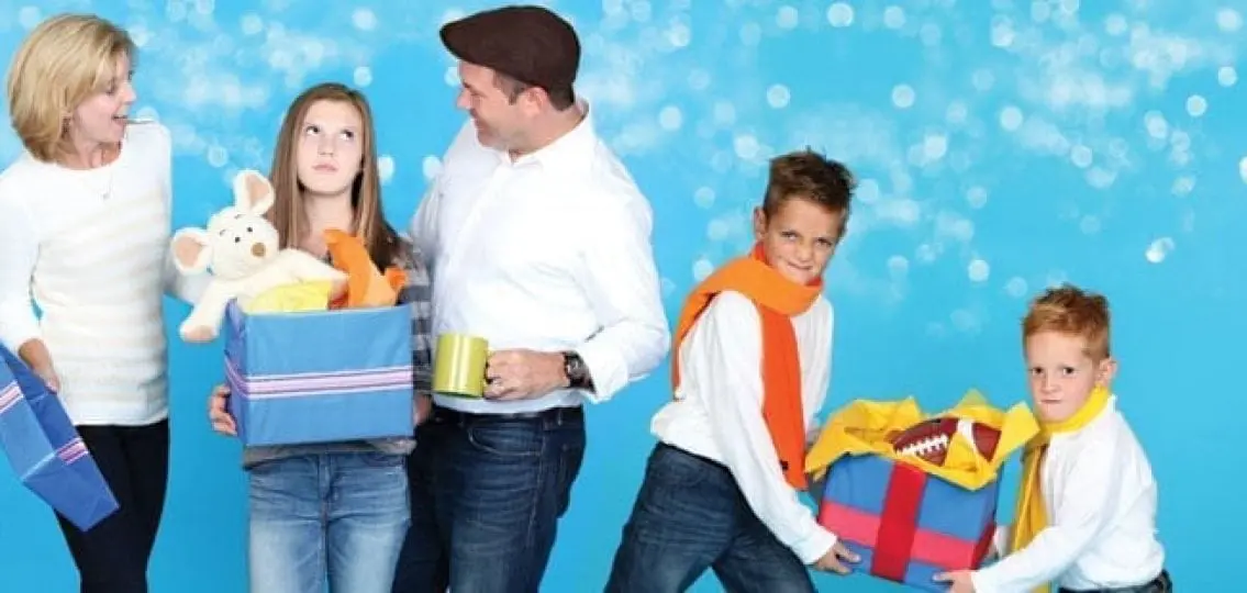 family taking a holiday photo angry teen daughter and fighting sons