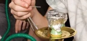 close up of a hookah being smoked