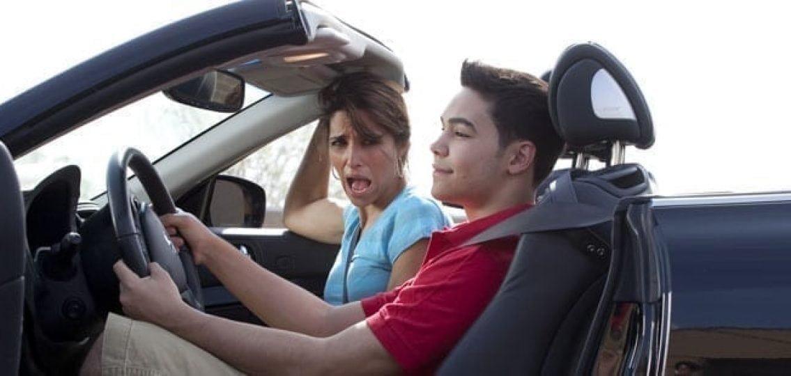 screaming mom in the passenger seat while teaching her son to drive