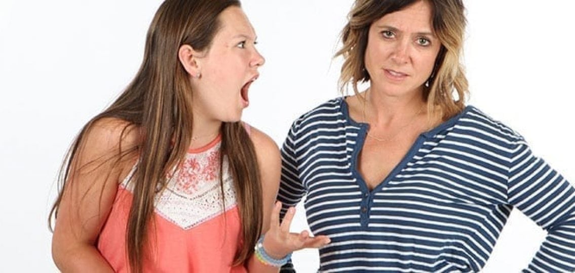 teen girl screaming at her exhausted mother