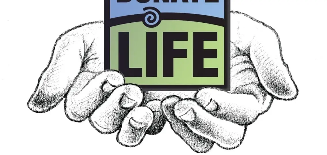 illustration of hands holding a sign that says Donate Life with the caption give thanks. give life.