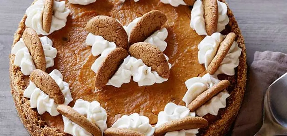 pumpkin pie with gringersnap crust and gingersnap cookies embedded