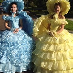 southern_belle giant dresses with huge sun hats and ruffles source: pinterest.com