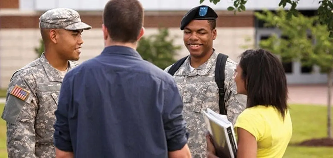 teens in military uniforms on a college campus