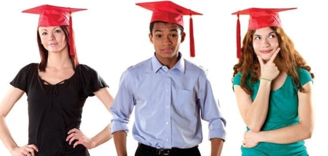 teenagers wearing graduation caps without robes on a white background