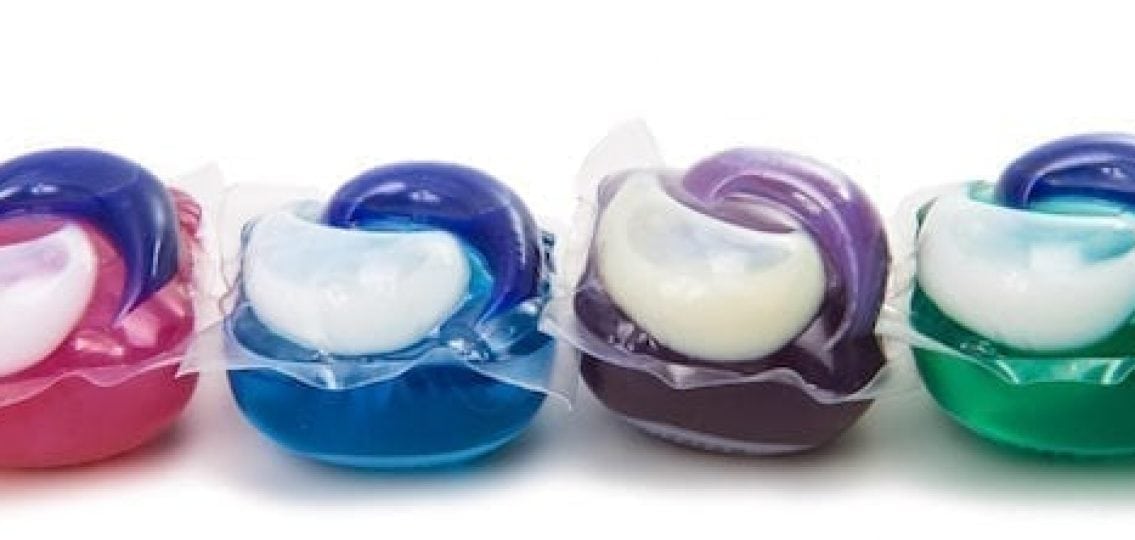 multicolored tide pods on a white background