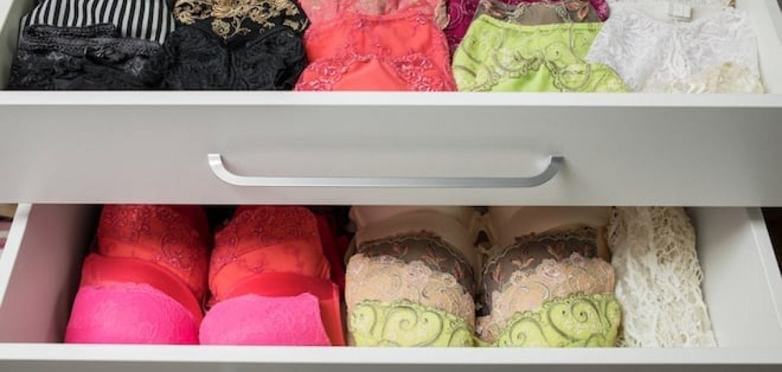 several open drawers full of lacy underwear