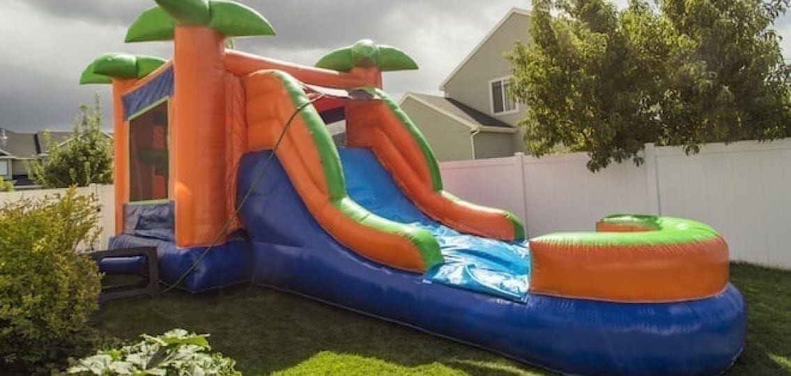 a large backyard inflatable water slide