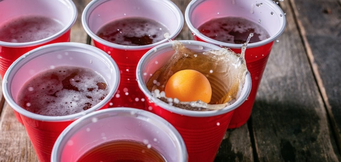 beer pong ping pong landing in a red solo cup