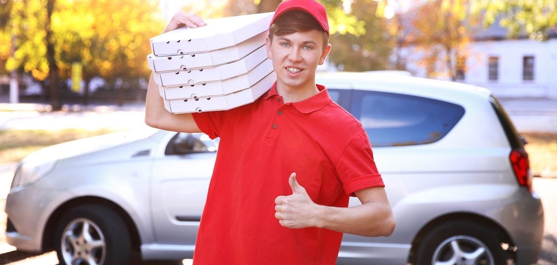Pizza Delivery Boy Holding Boxes With Pizza Near Car