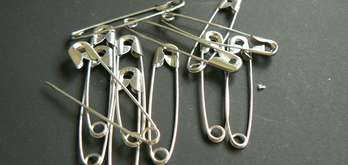 Safety pins lying in a pile