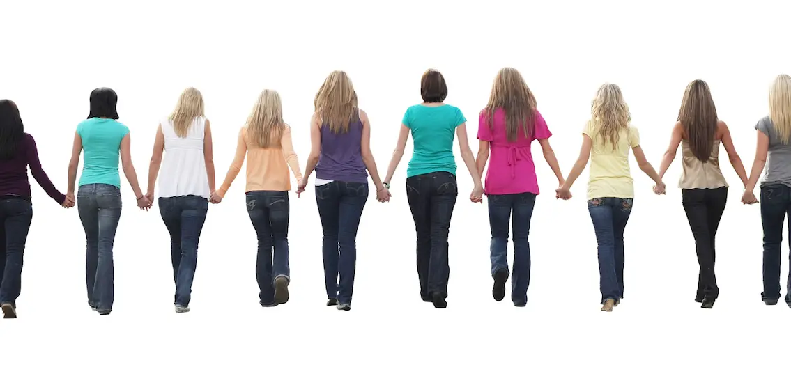 Ten beautiful young women, walking hand in hand facing away from camera.