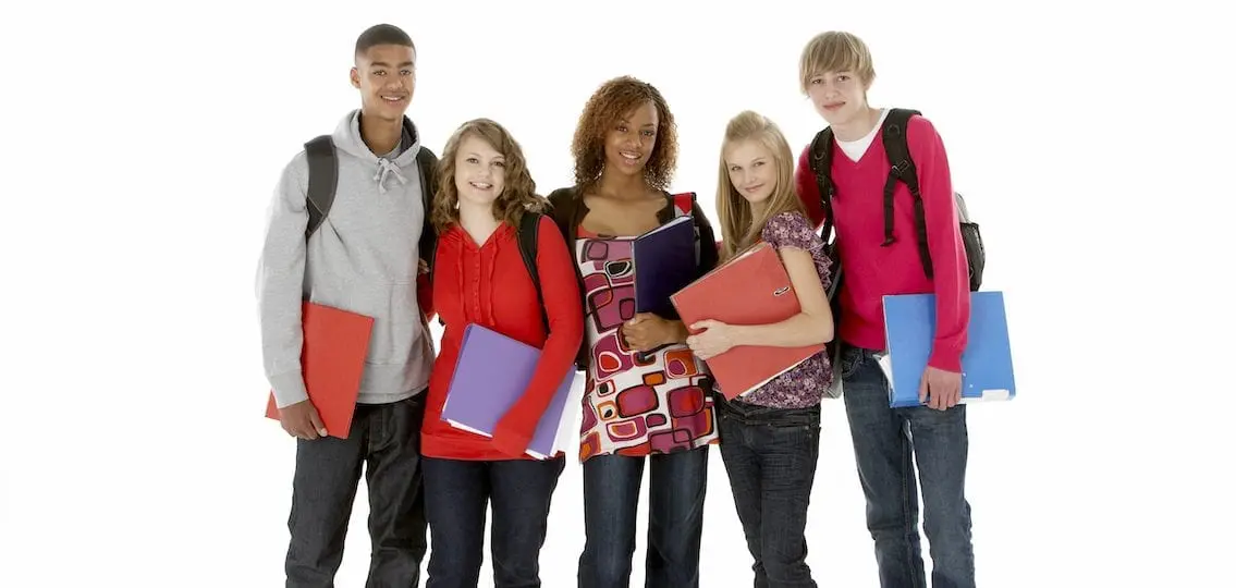 Teenagers with binders standing together