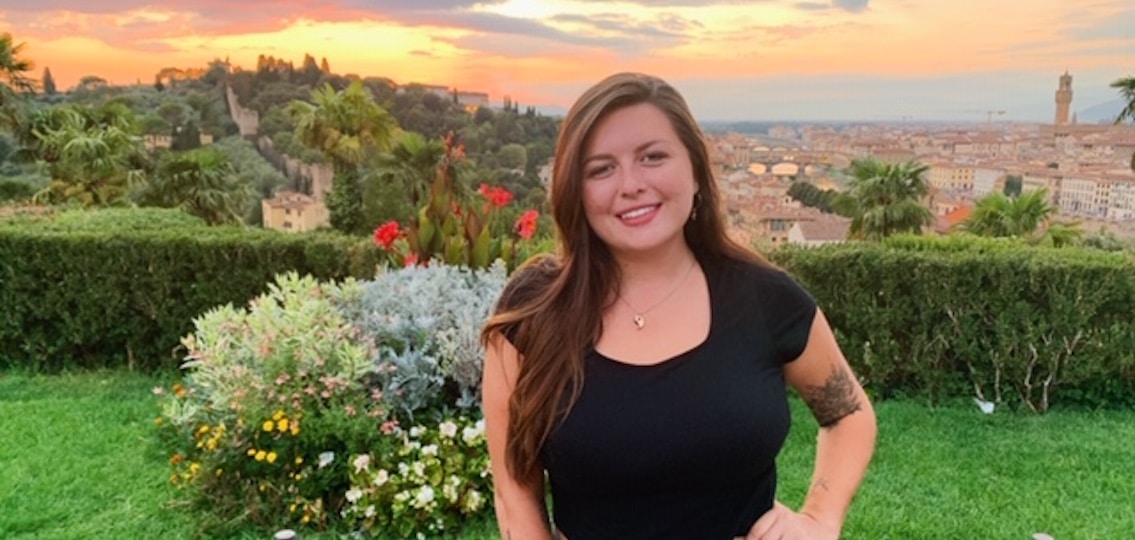 Teen college student in Italy studying abroad outisde