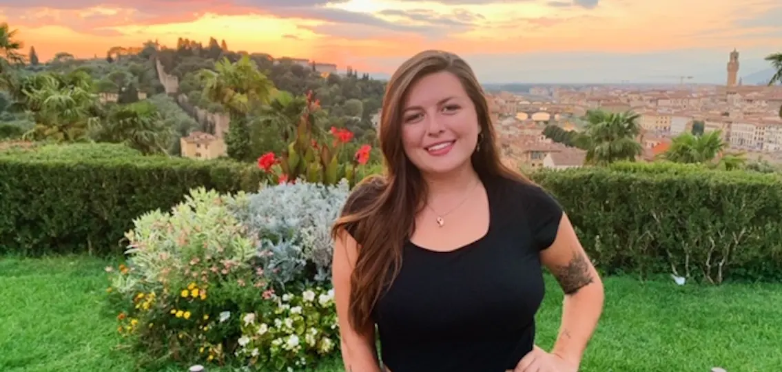 Teen college student in Italy studying abroad outisde