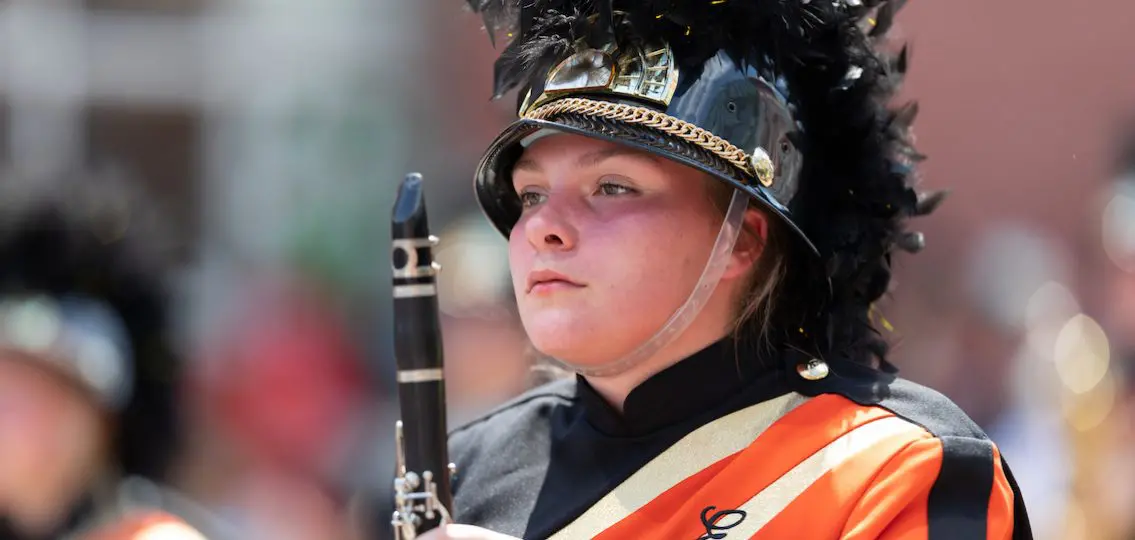 Teen playing in the band close up