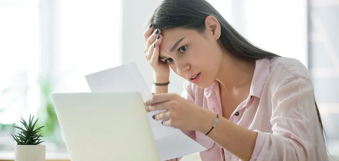 Worried Frustrated Woman Shocked By Bad News While Reading Letter