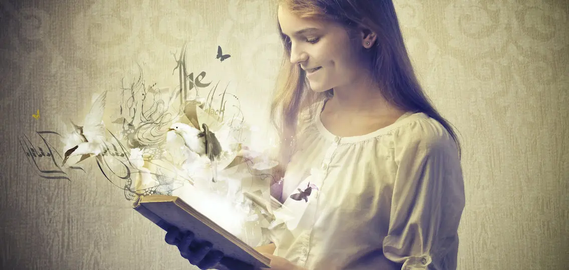 young teen girl reading a book with light and butterflies fluttering out from the pages