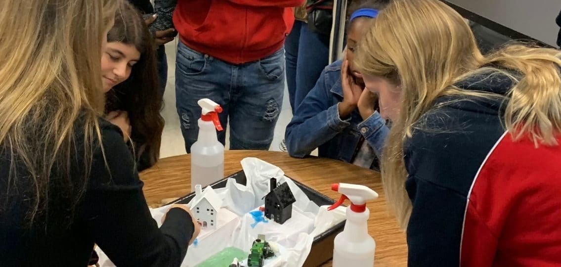 girls in stem program at beachwood high school doing science experiment