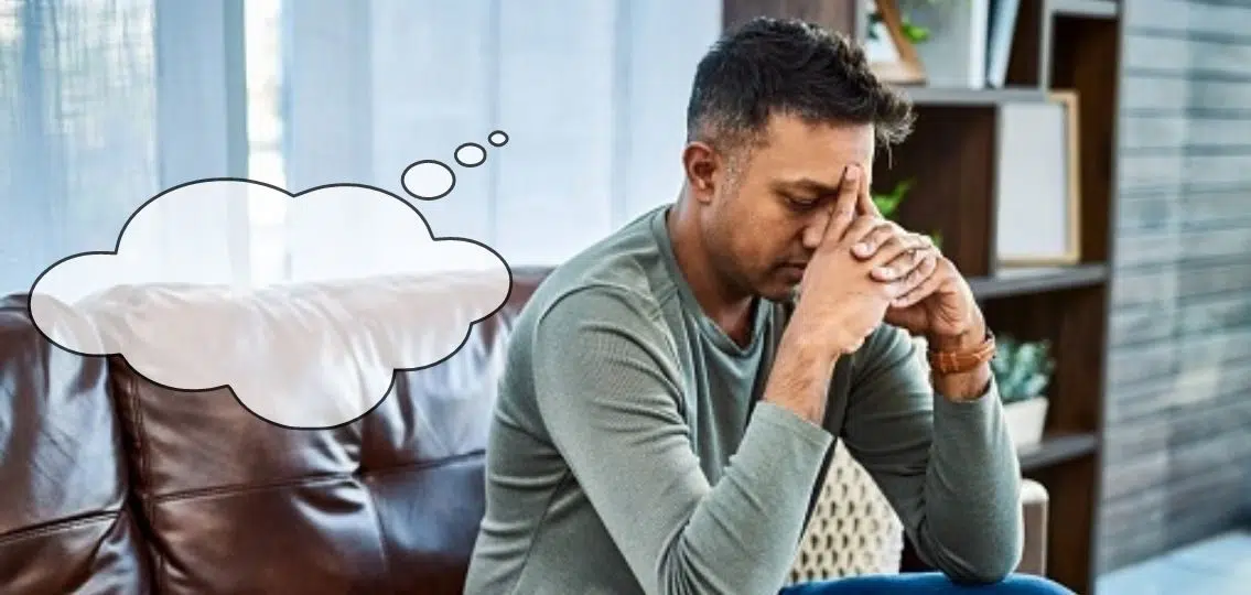 parenting worries father stressed out on couch