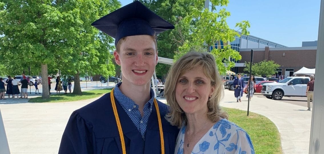 author and her teen son at his high school graduation celebration