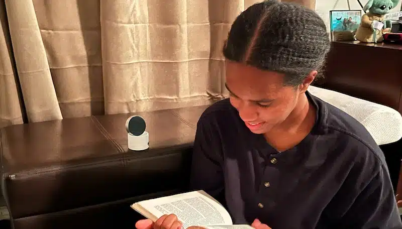 Teen reading book with Lecto Fan