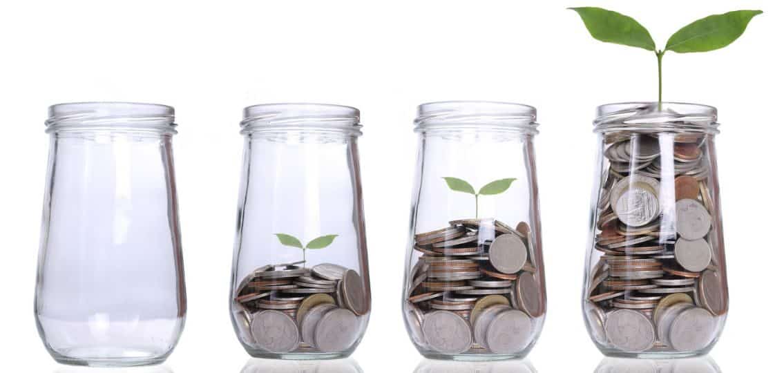 529 College savings plan, jars filling more and more with money as a plant sprouts out
