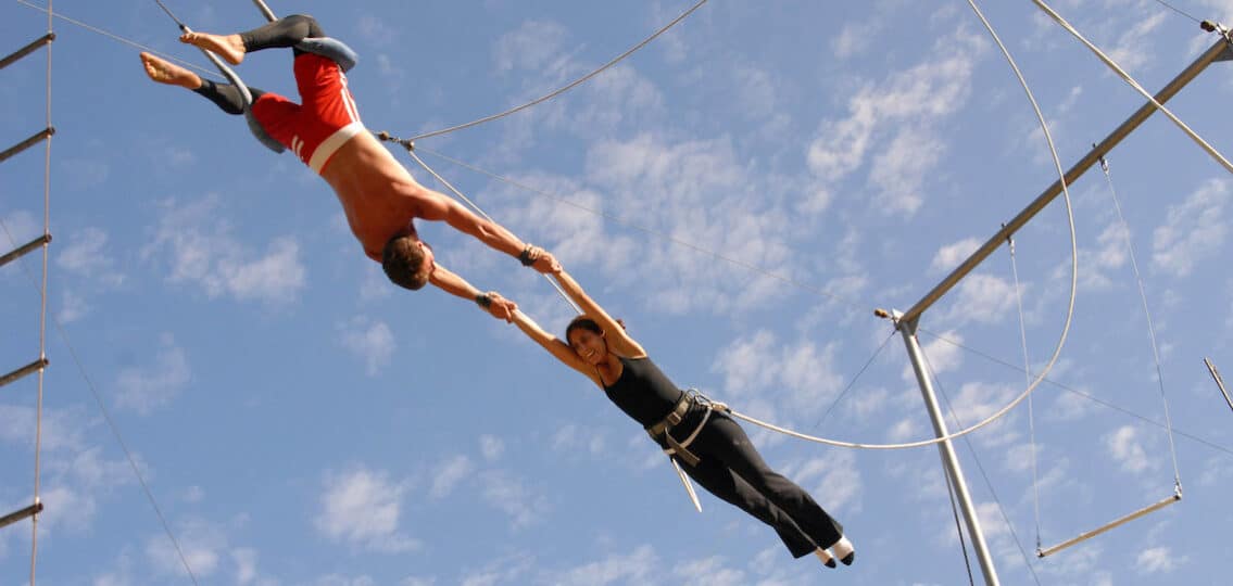 Learning trapeze at summer camp for teens