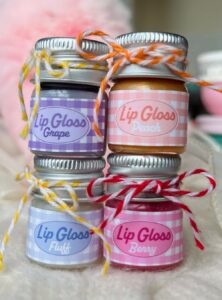 4 small jars of lip gloss