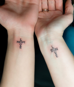 matching mother son tattoo