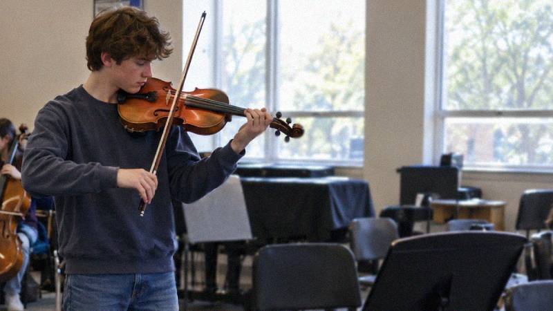 Boy playing violin